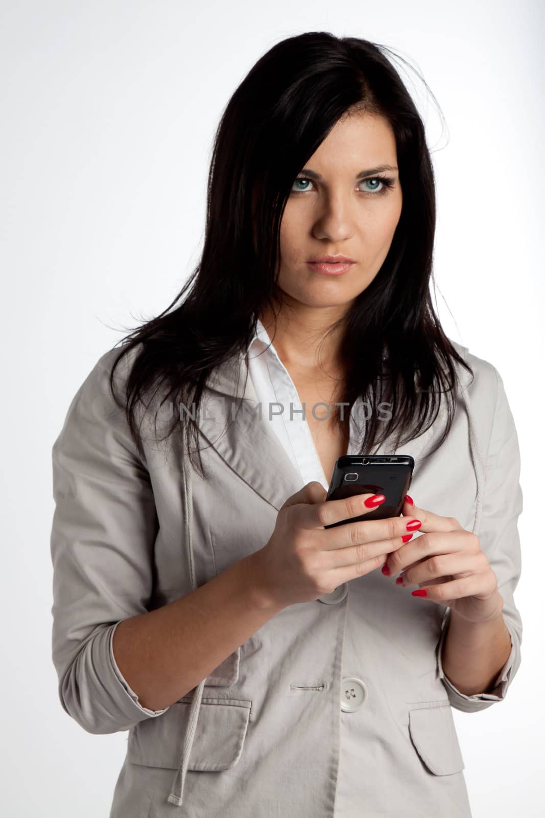 Image of young pretty people receiving SMS on your mobile phone