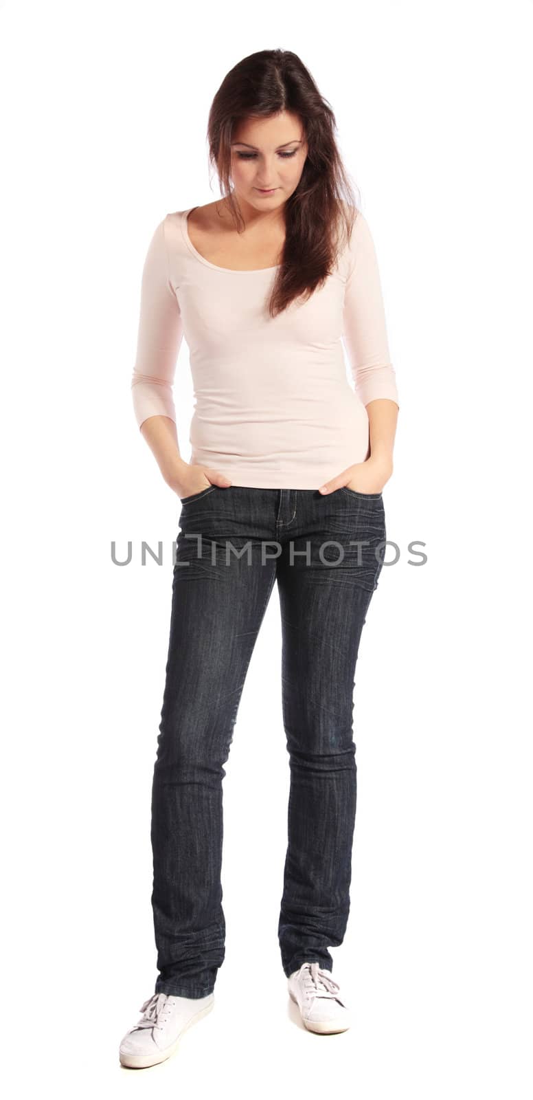 Attractive young woman looking down. All on white background.