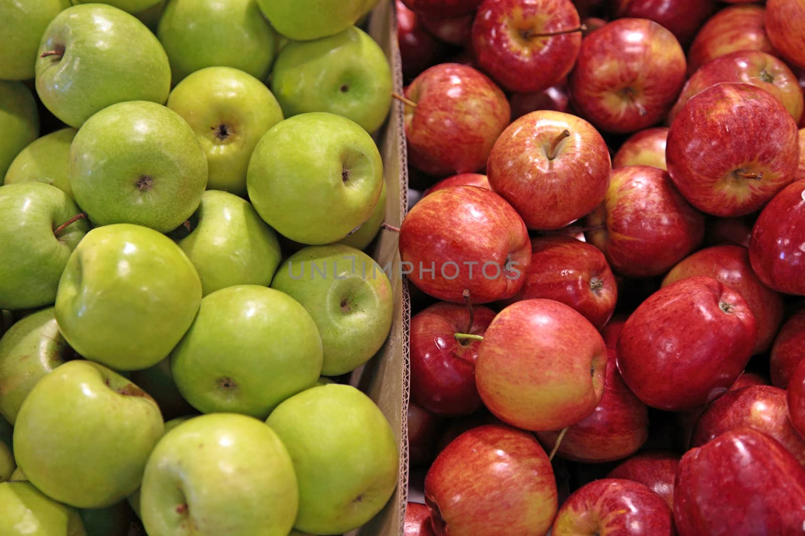 Box of green and red apples.