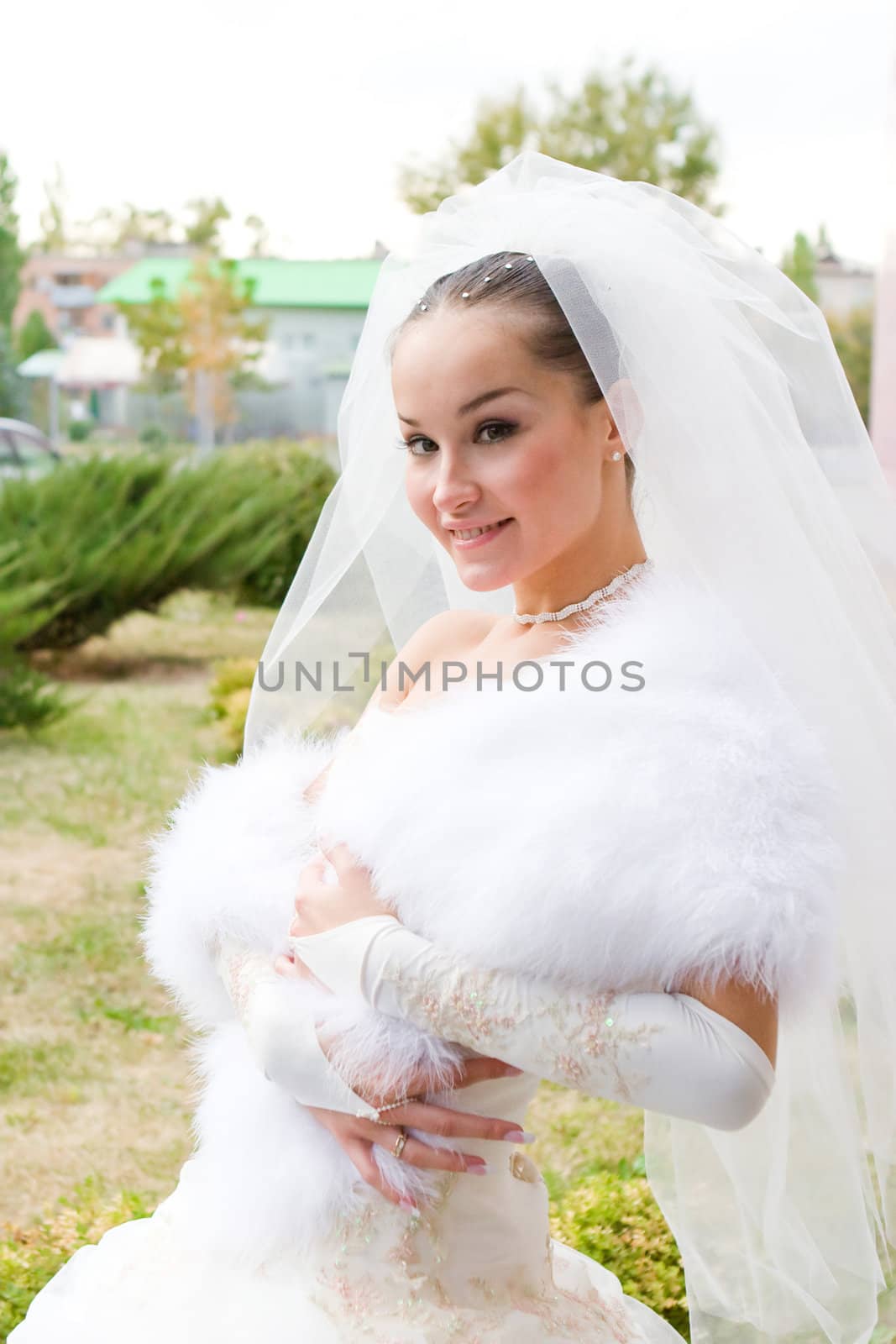 happy bride in a fur cape by vsurkov