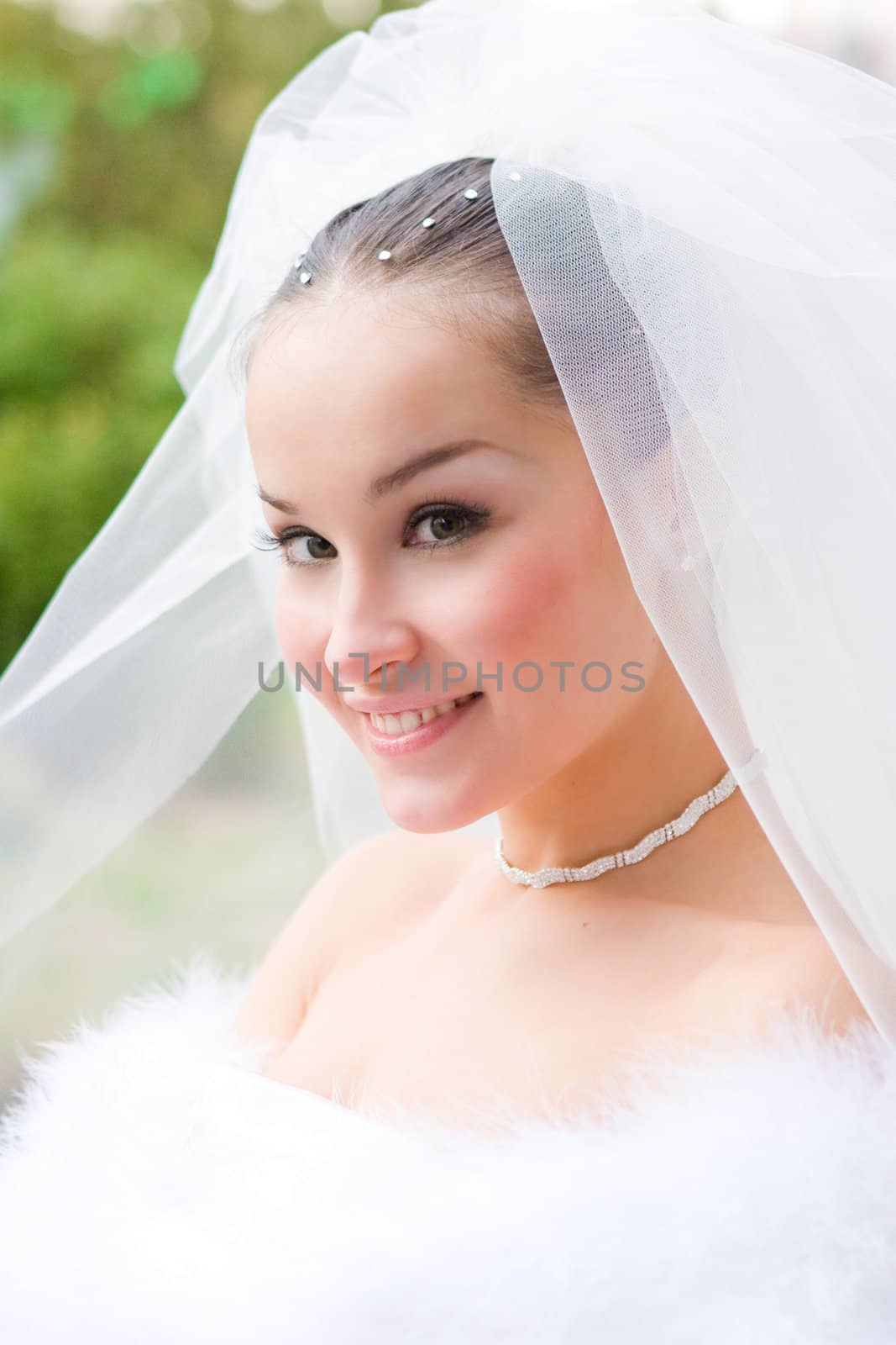 portrait of the happy bride outdoors