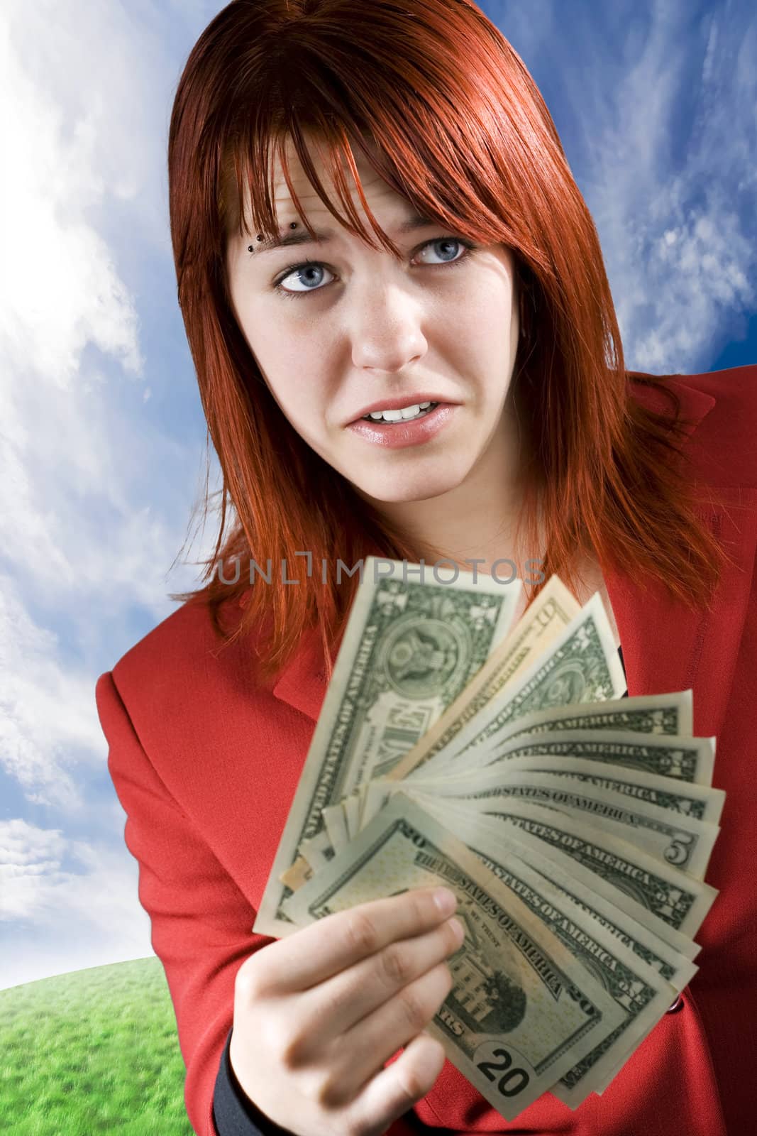 Surprised girl waving American dollars by domencolja
