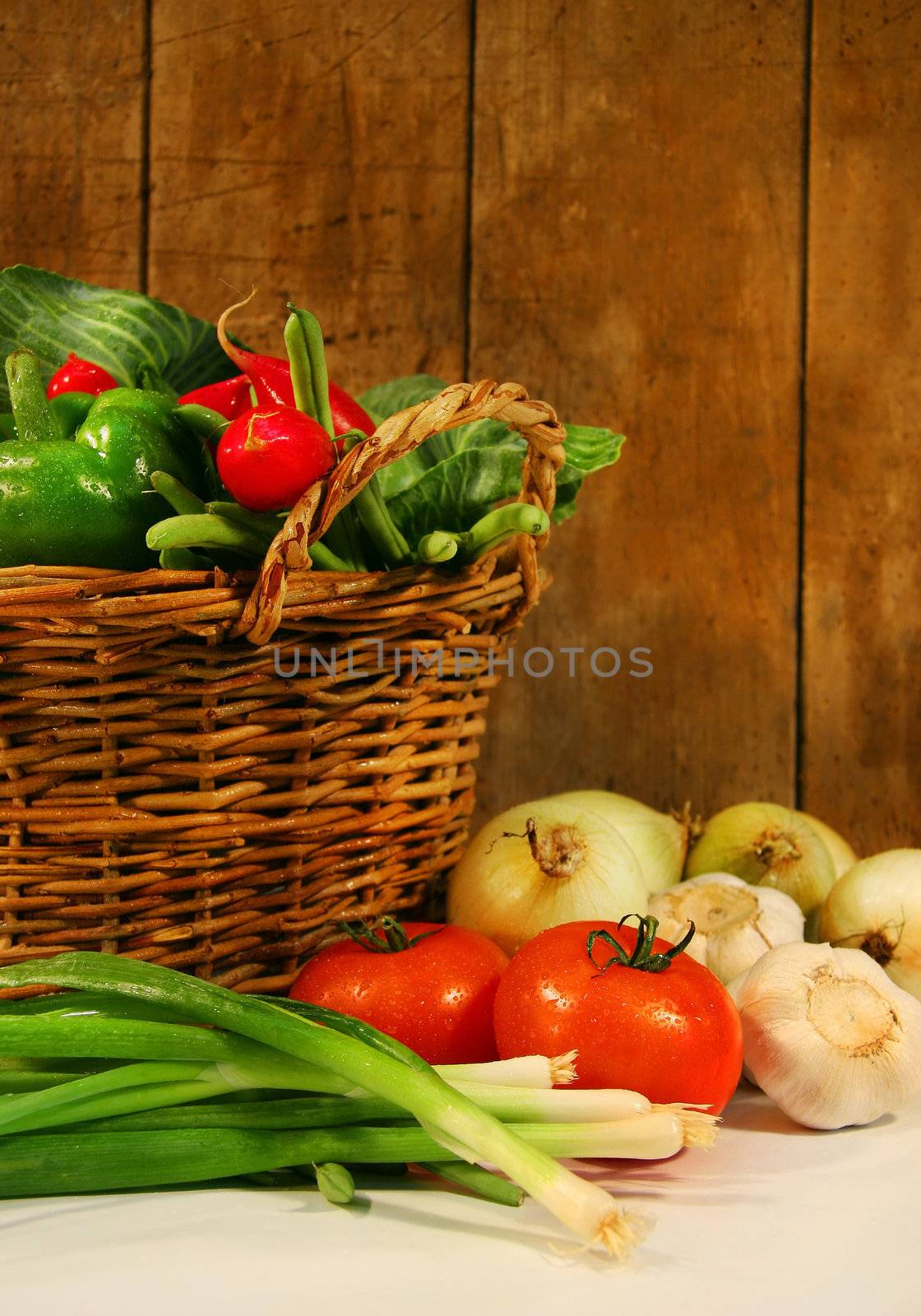 Vegetables in a basket by Sandralise