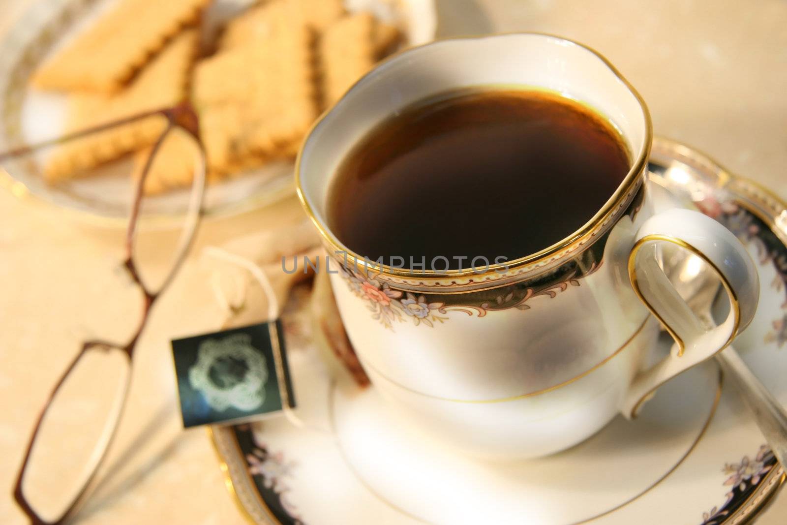 Cup of english breakfast tea with cookies for break time