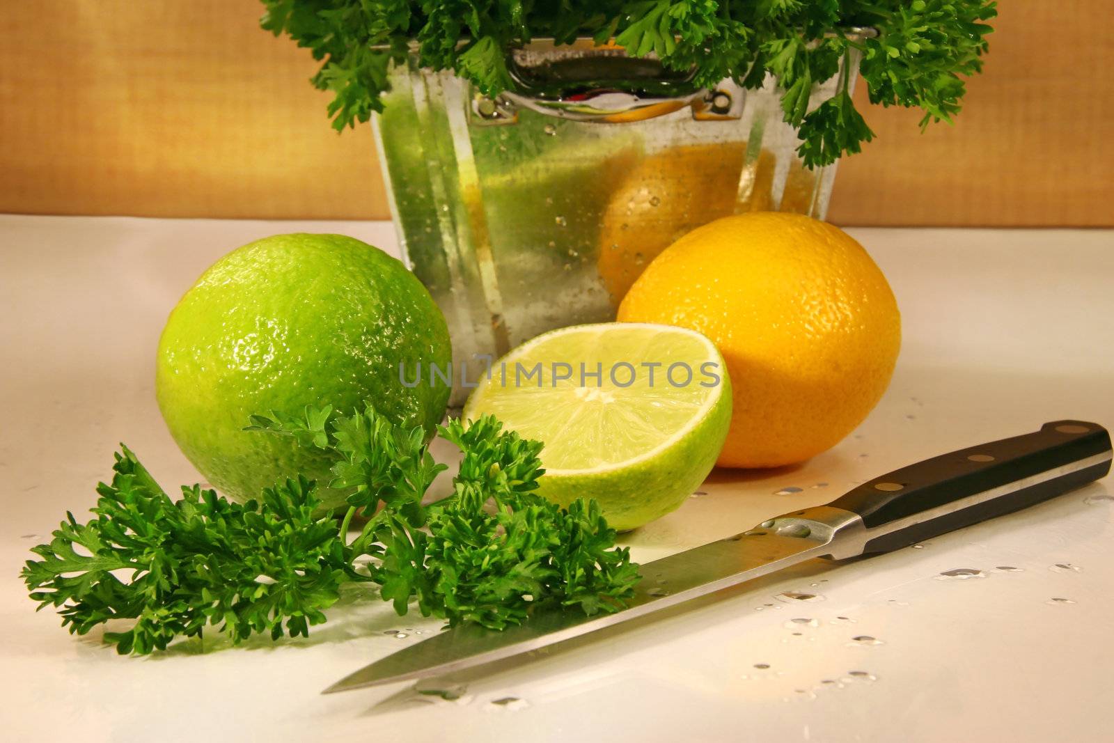 Parsley and freshly cut citris fruit on counter