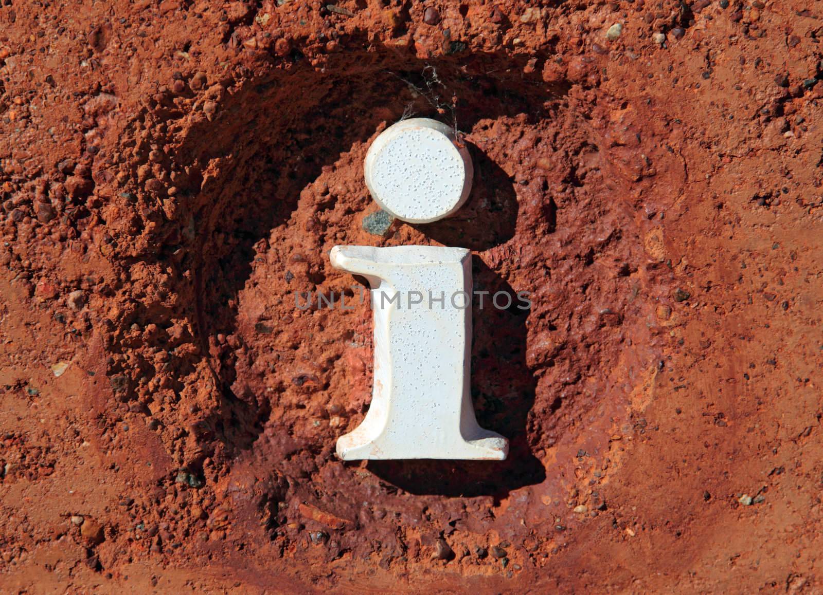 Infromation sign embedded in red natural stone.