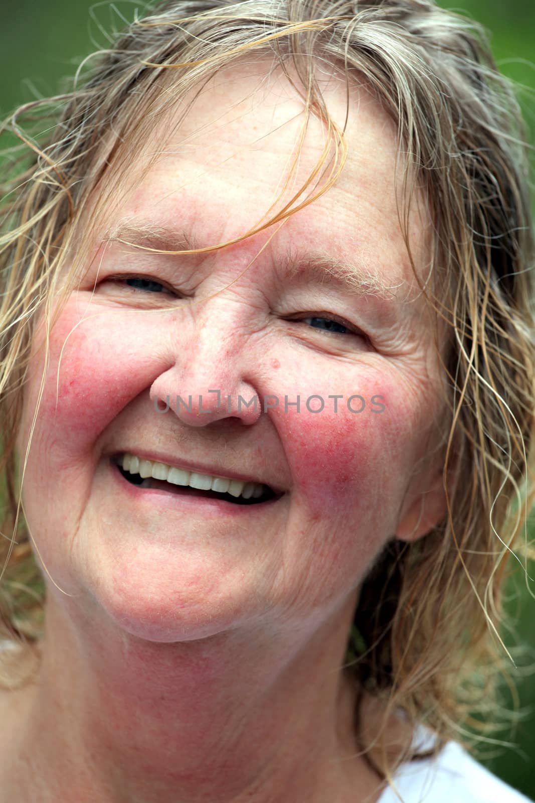 Mature irish woman posing outside.