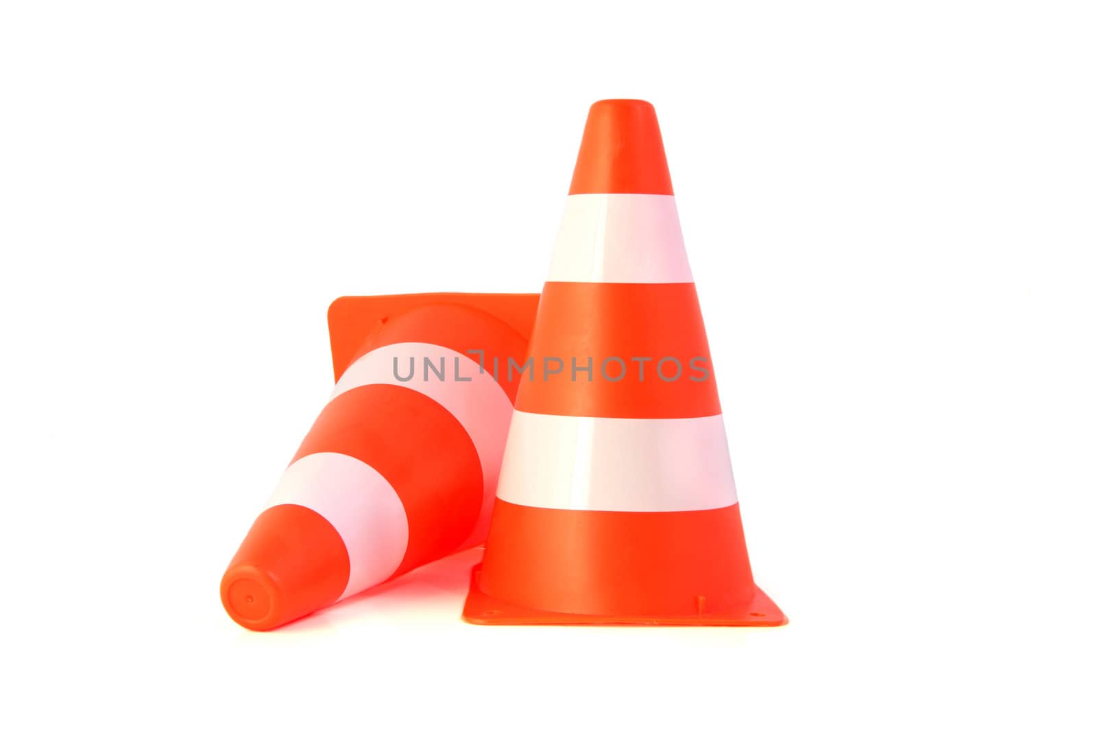 Two orange traffice cones. All on white background.