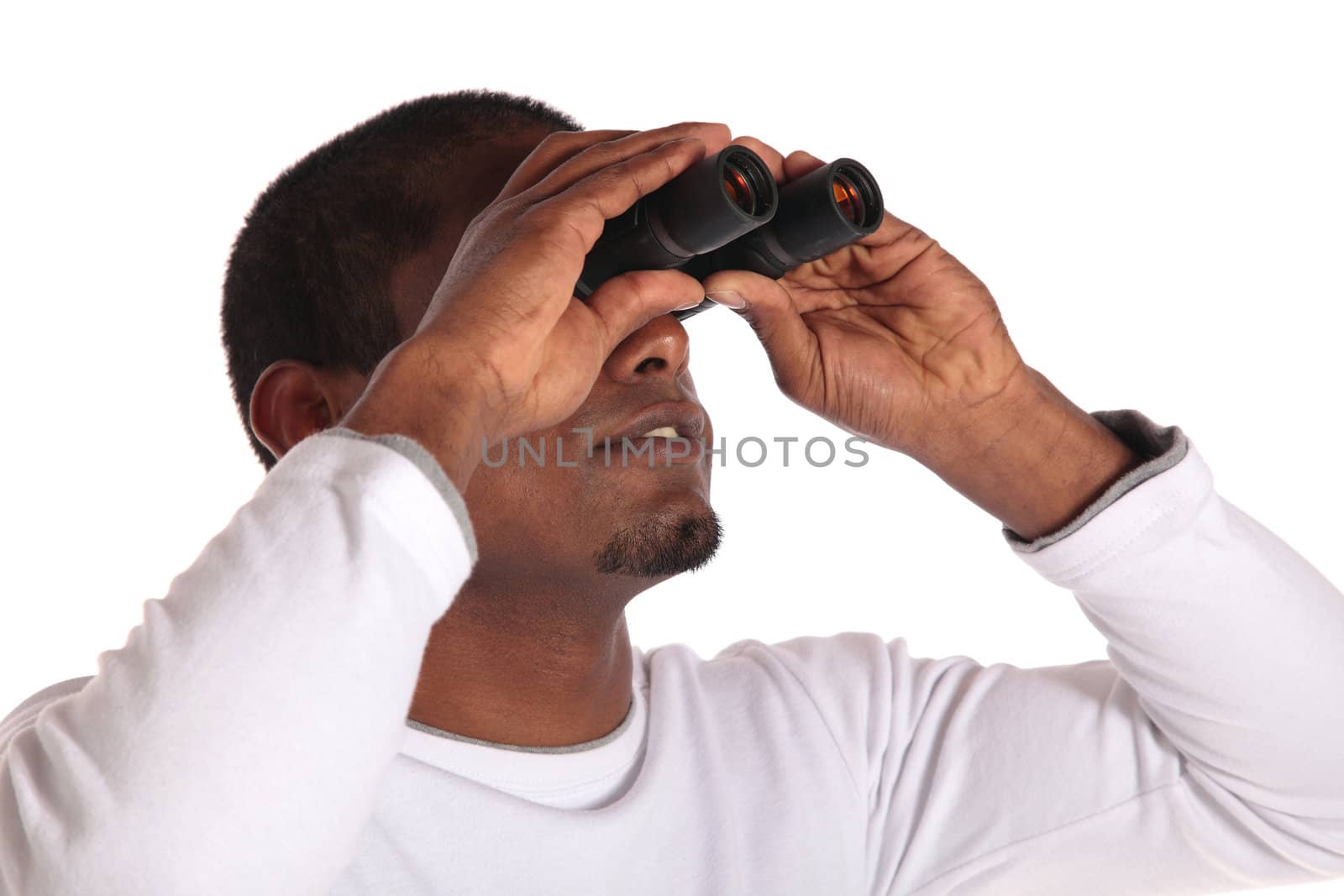 An attractive dark-skinned man using a spyglass. All on white background.