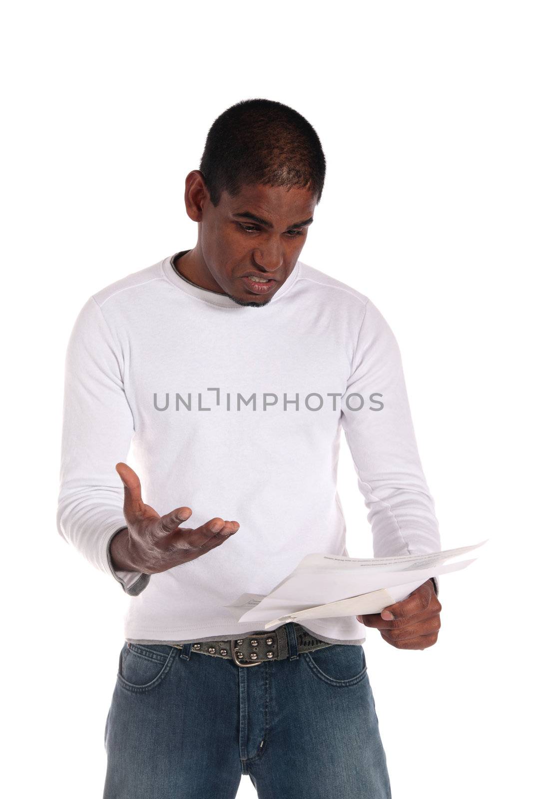 An attractive dark-skinned man getting shocking news via mail. All on white background.