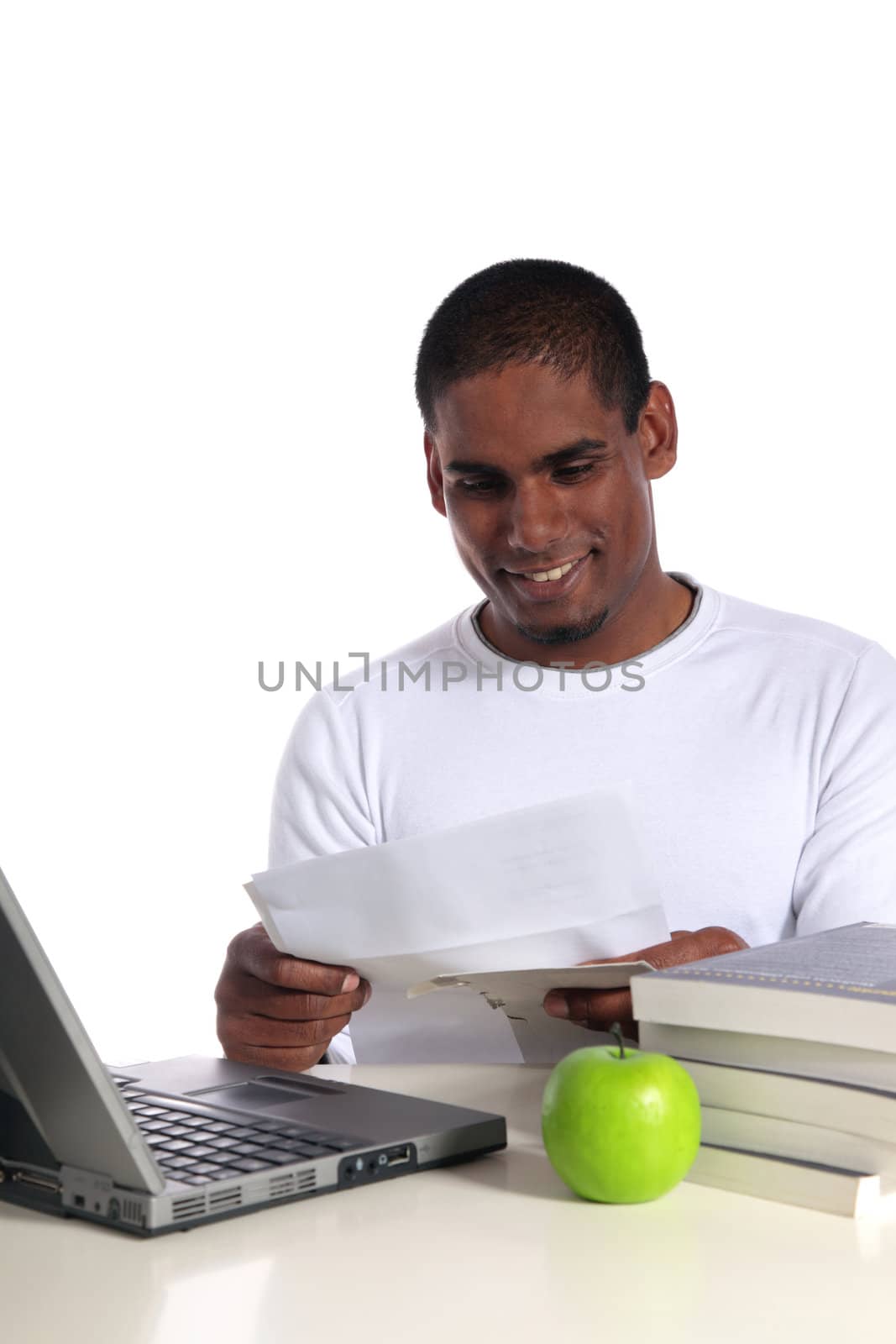 An attractive dark-skinned student getting good news via mail. All on white background.
