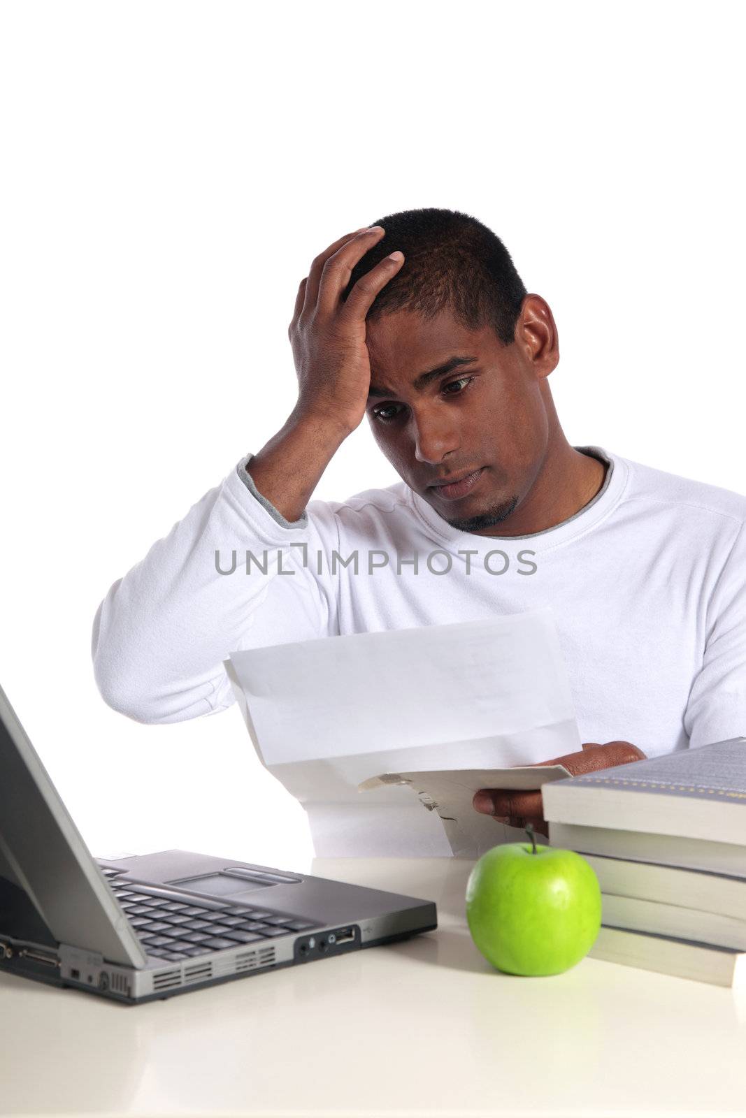 An attractive dark-skinned student getting bad news via mail. All on white background.