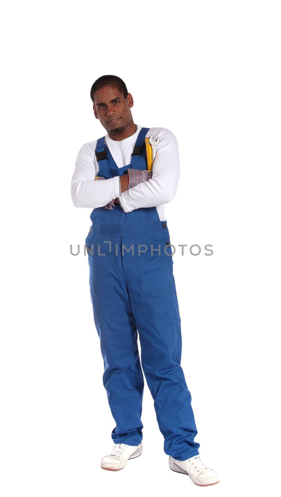 An ambitious dark-skinned worker standing. All on white background.