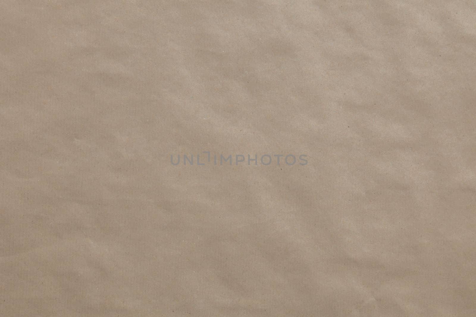 A brown background texture of packing paper.