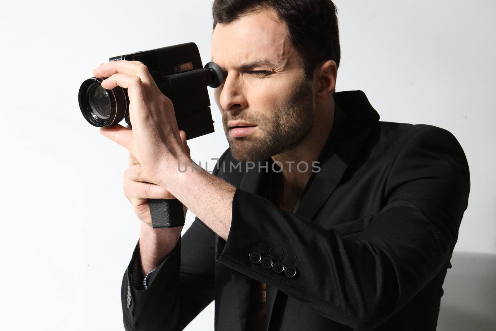 Attractive man taking photo by robert_przybysz