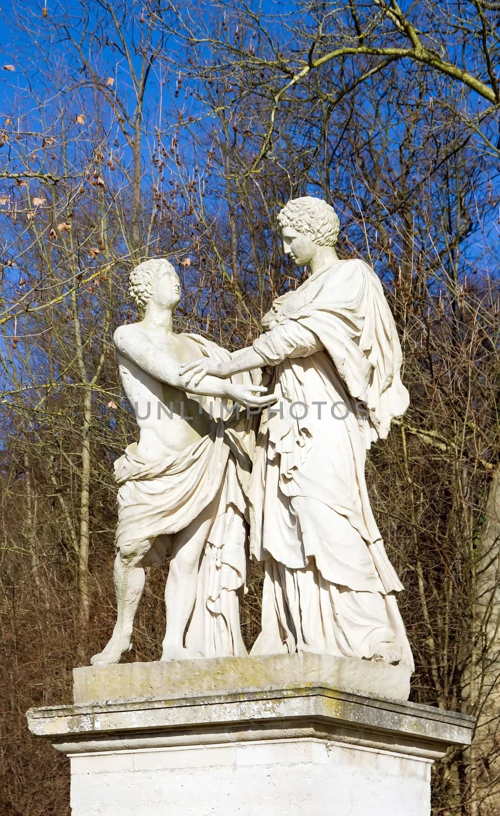male friendship, ancient statue depicting two men having affection for one another