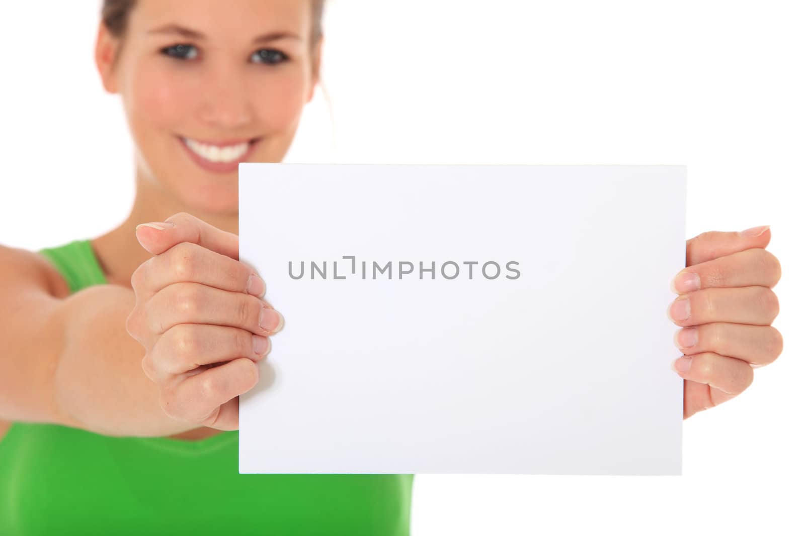 Attractive young woman holding blank white sign. All on white background.