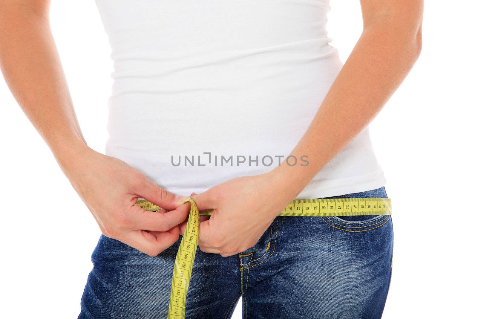 Attractive young woman using measuring tape. All on white background.