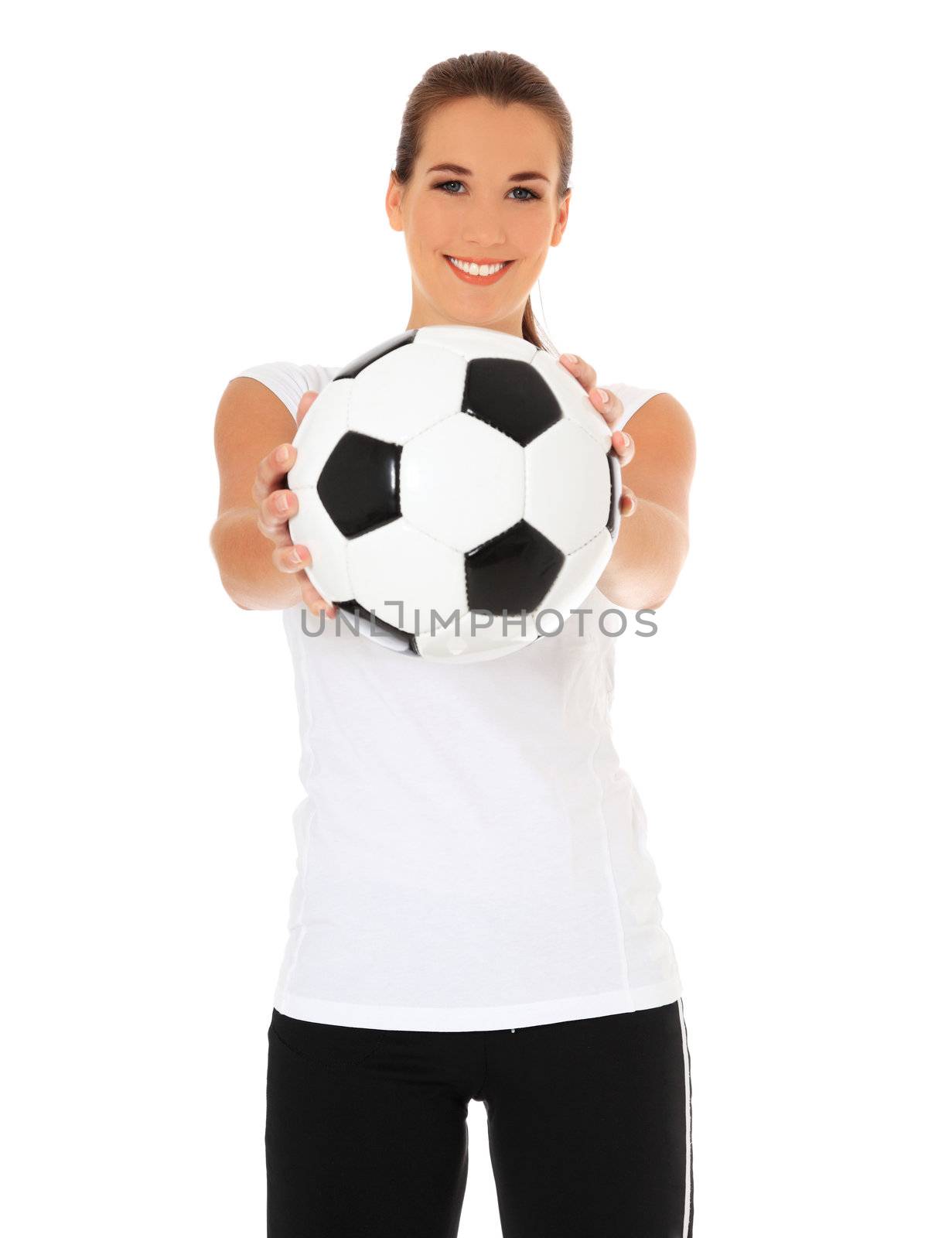 Attractive young woman in sports wear holding soccer ball. All on white background.