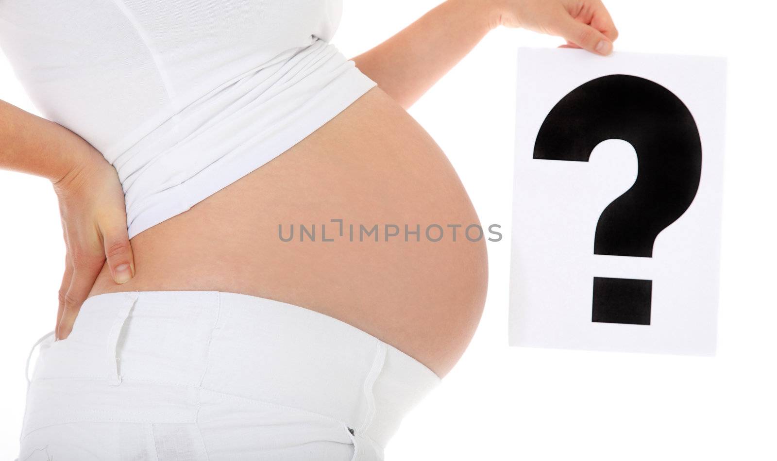 Pregnant woman holding big question mark. All on white background.