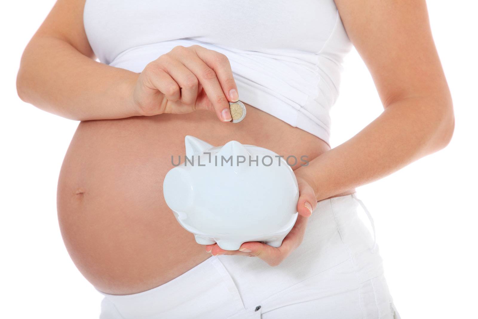 Pregnant woman puts money in piggy bank. All on white background.