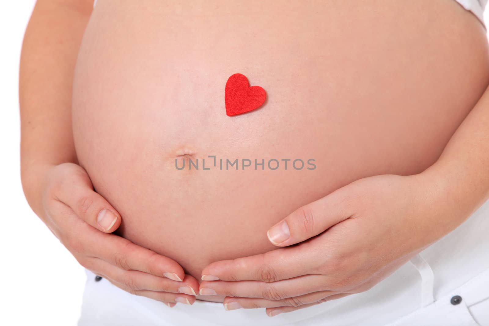 Pregnant woman with single red heart on her baby bump. All on white background.