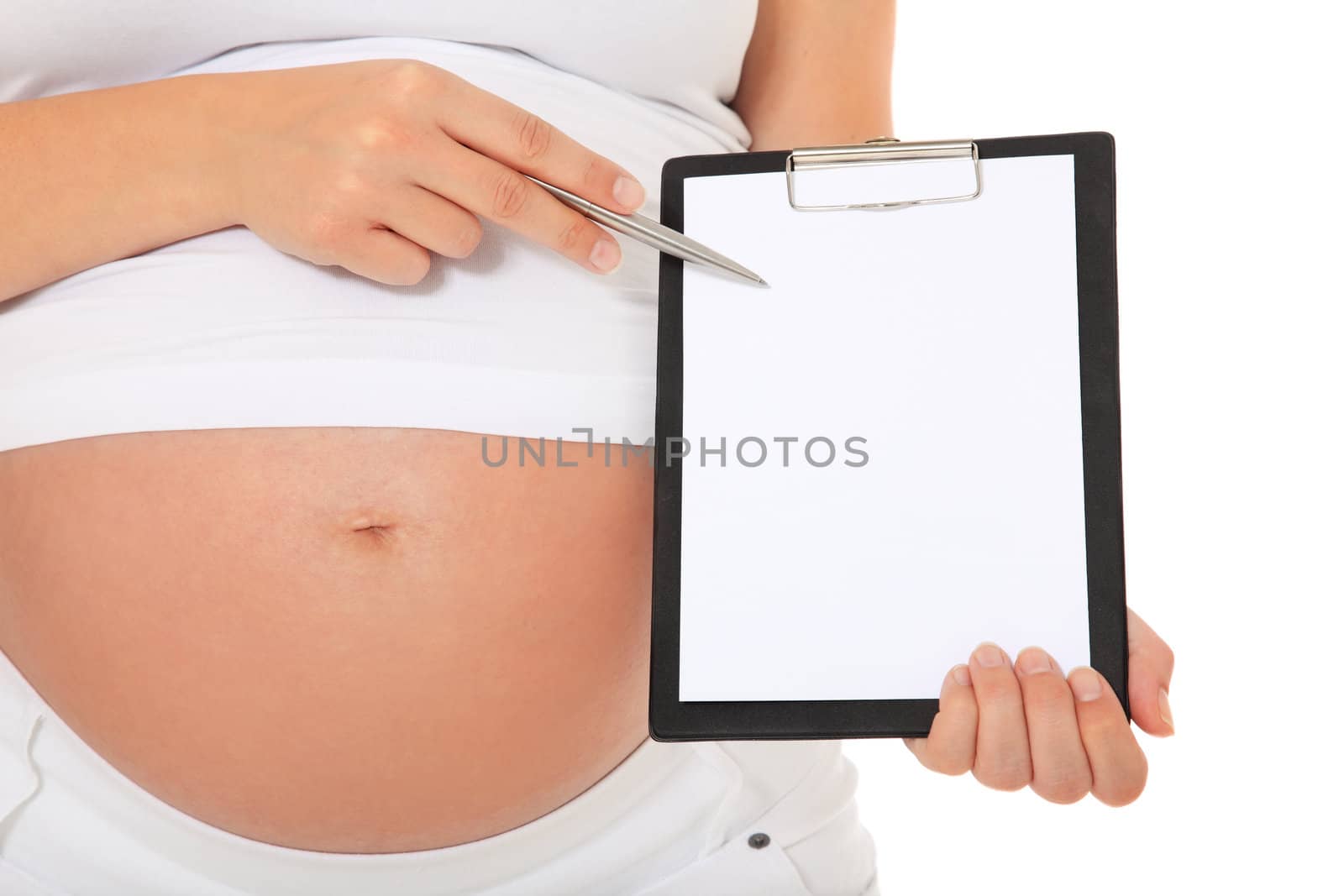 Pregnant woman pointing at blank clipboard. All on white background.