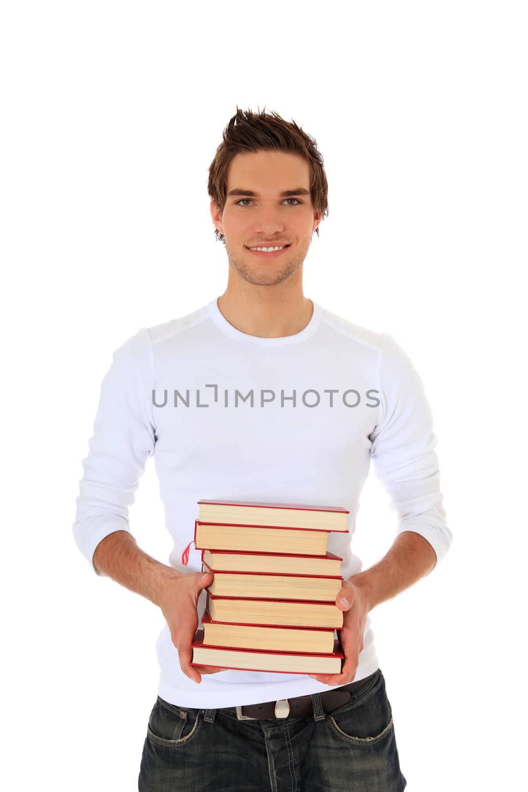 Attractive student carrying pile of books. All on white background.