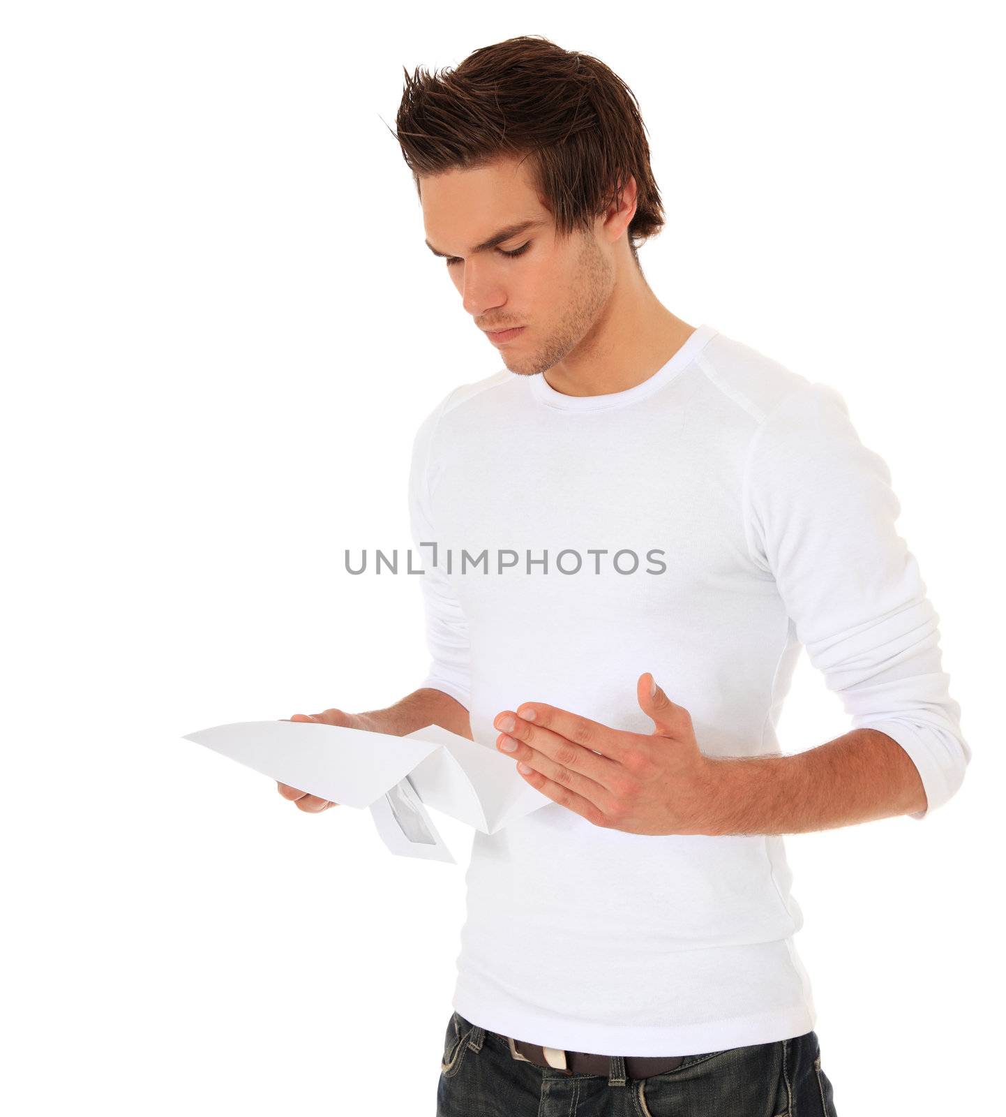 Attractive young man getting bad news. All on white background.