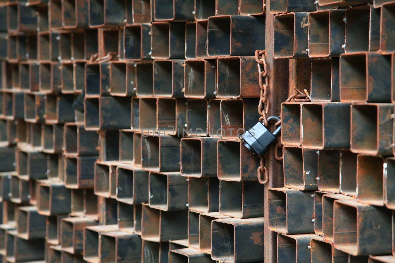 Perspective of locked steel fence