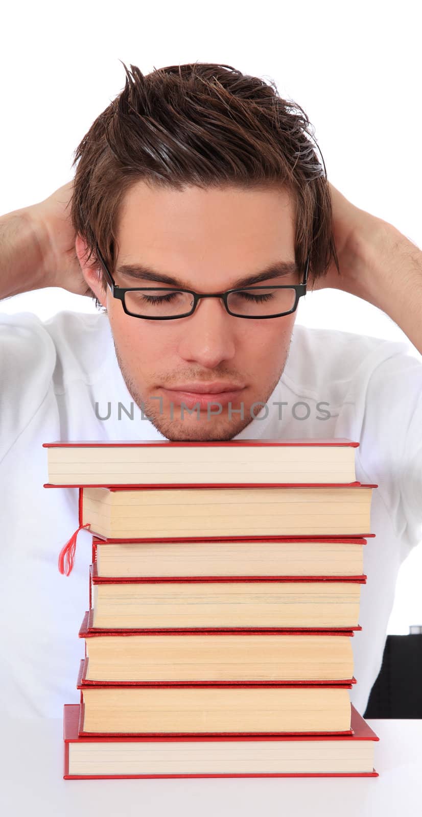 Attractive student taking a break. All on white background.