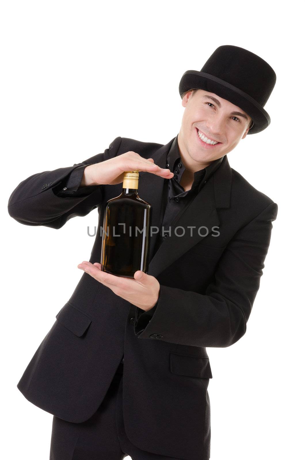 Handsome fashionable man in retro style demonstrate dark bottle with alcoholic drink isolated on white background
