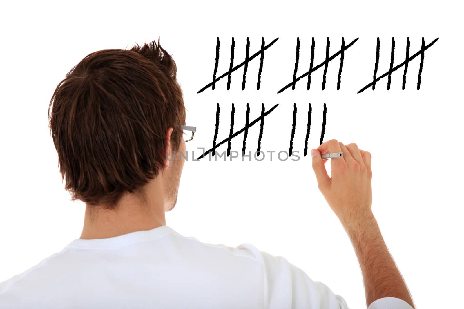 Back view of an attractive young man counting. All on white background.