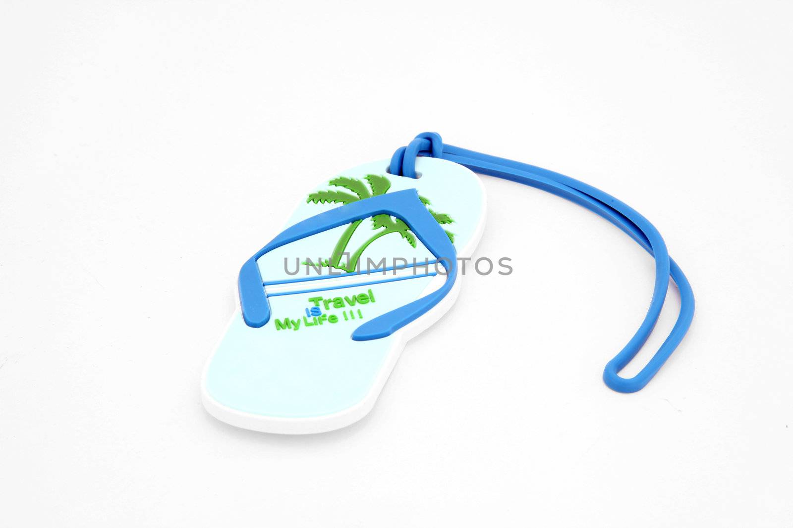 isolated luggage name tag in sandal shape