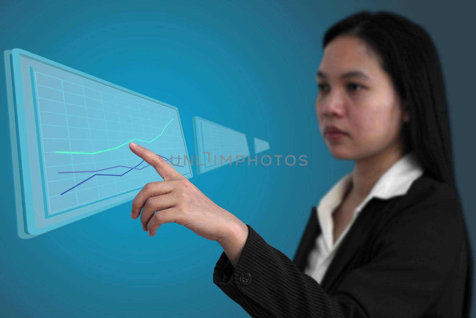 asian business woman touch up trend graph interface (Selective focus on finger)