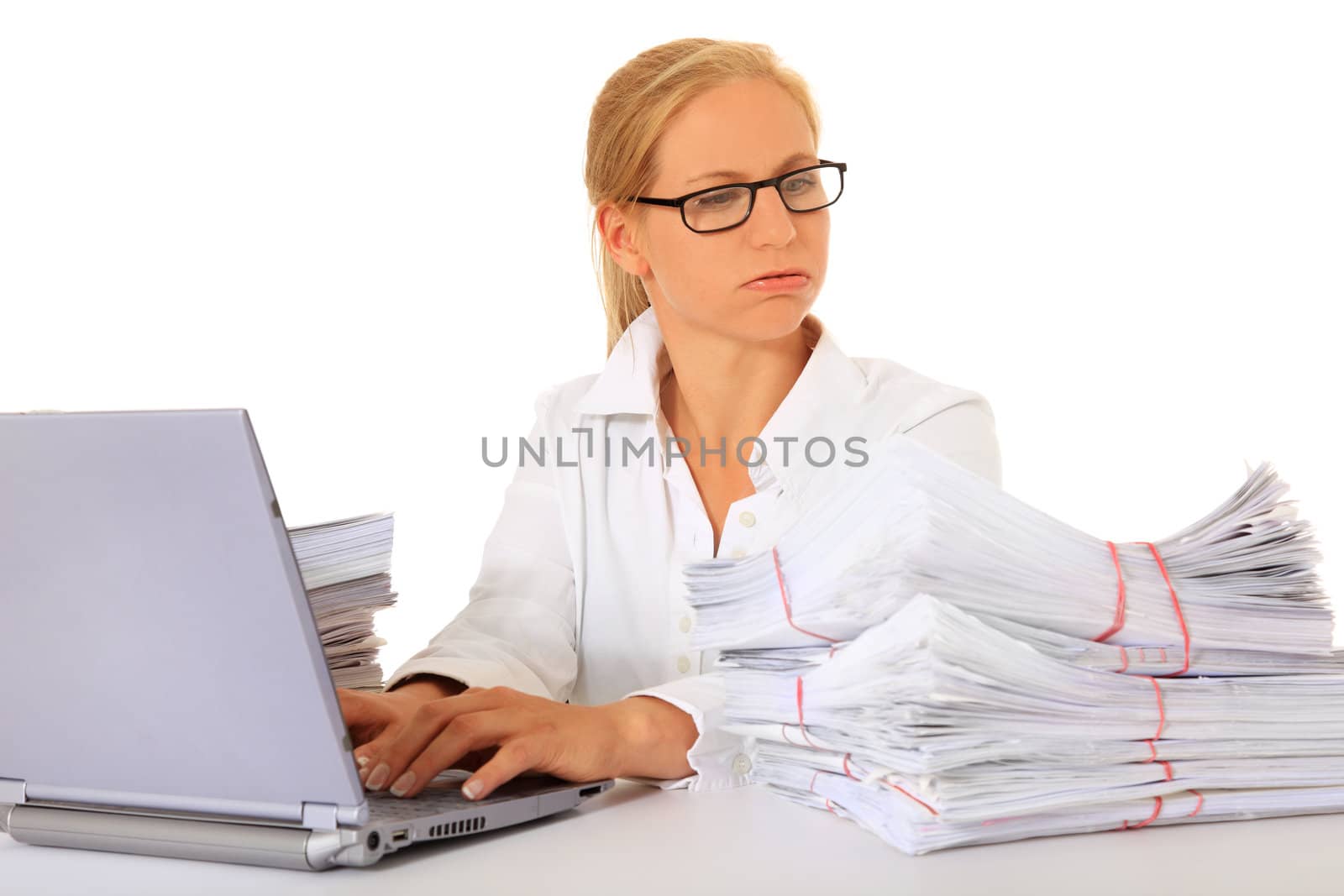 Attractive businesswoman working. All on white background.