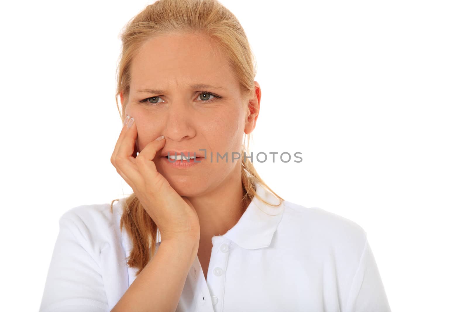 Attractive woman suffers from toothaches. All on white background.