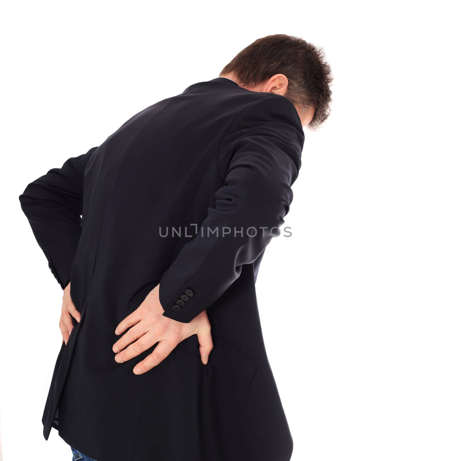 Middle-aged man suffering from back pain. All on white background.