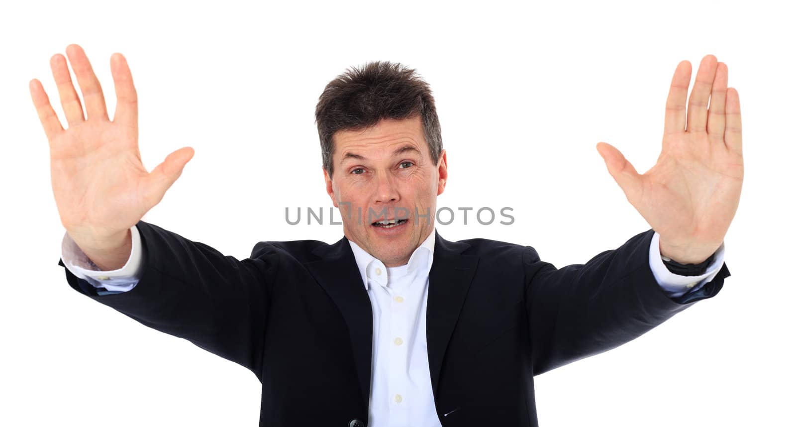 Attractive middle-aged man making repelling gesture. All on white background.