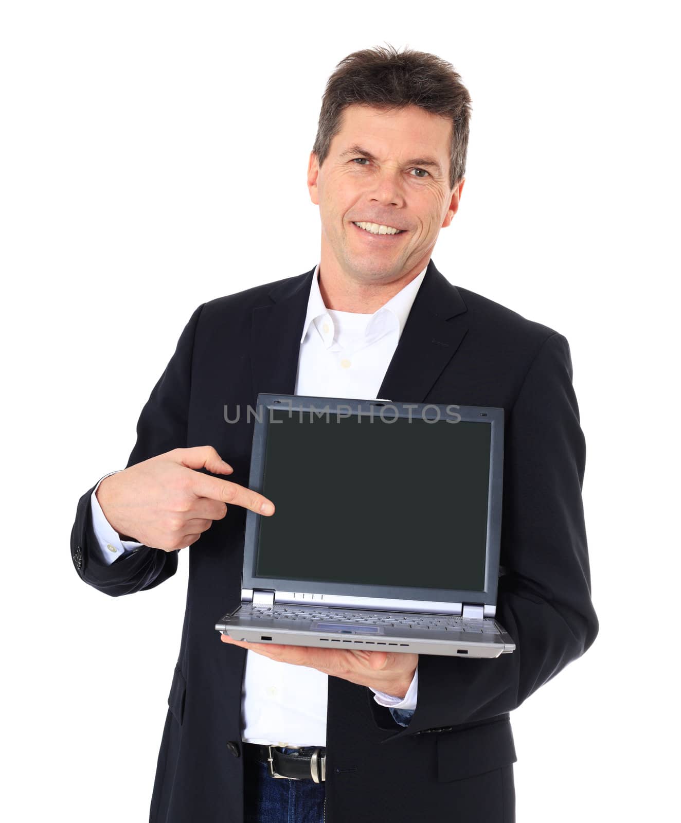 Attractive middle-aged man pointing on notebook computer. All on white background.