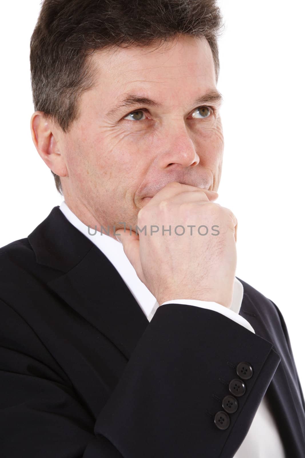 Attractive middle-aged man deliberates a decision. All on white background.