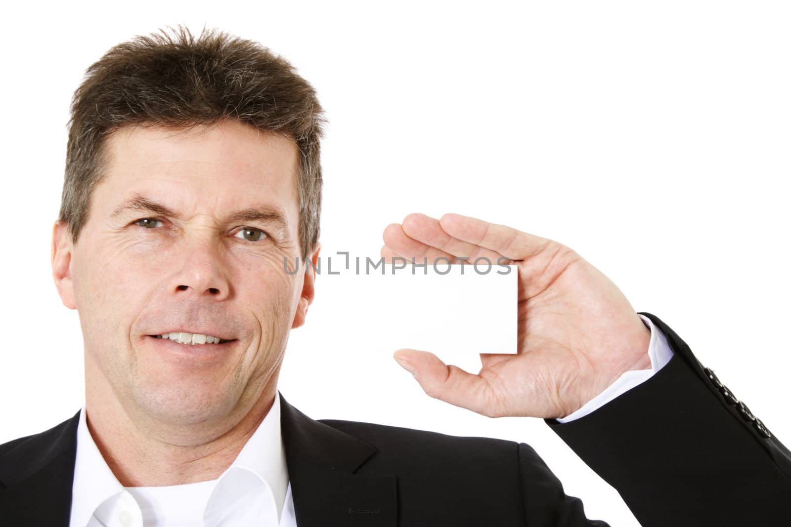 Attractive middle-aged man holding business card. All on white background.