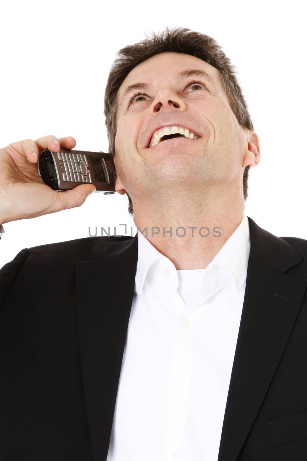 Attractive middle-aged man making a phone call. All on white background.