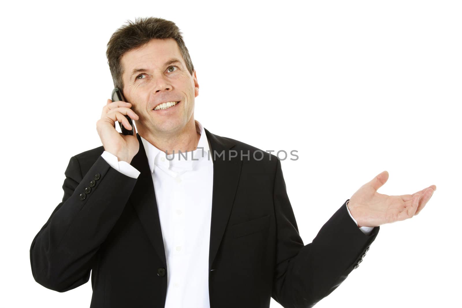 Attractive middle-aged man making a phone call. All on white background.