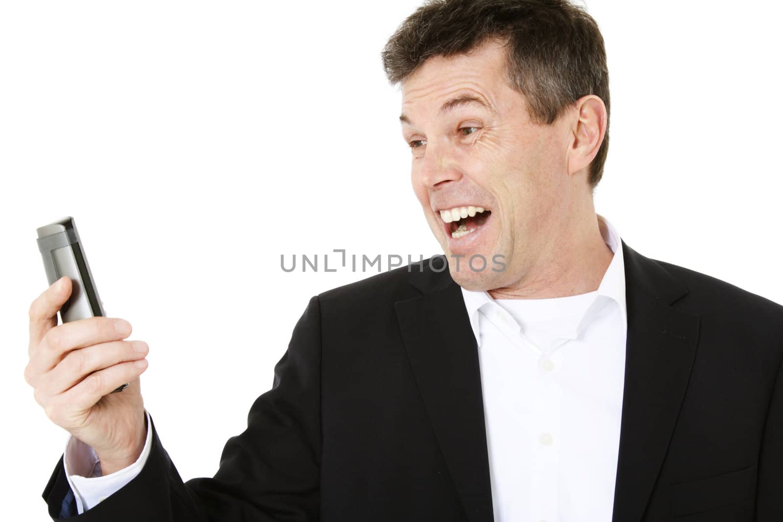 Attractive middle-aged man screaming at telephone. All on white background.