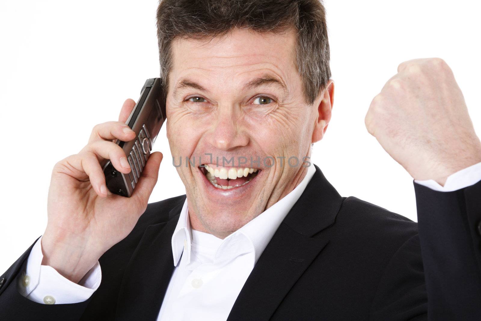 Cheering middle-aged man making a phone call. All on white background.