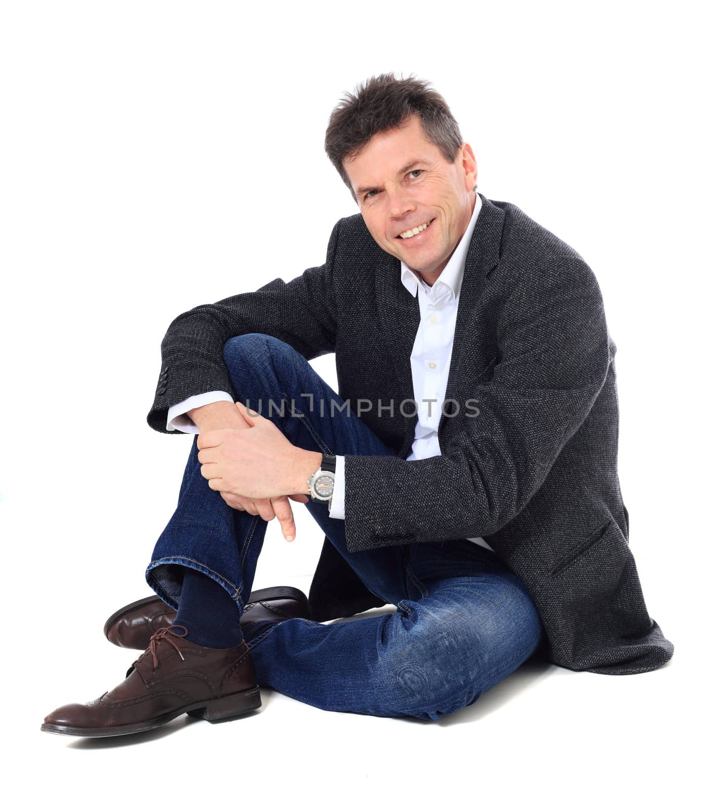 Attractive middle-aged man. All on white background.
