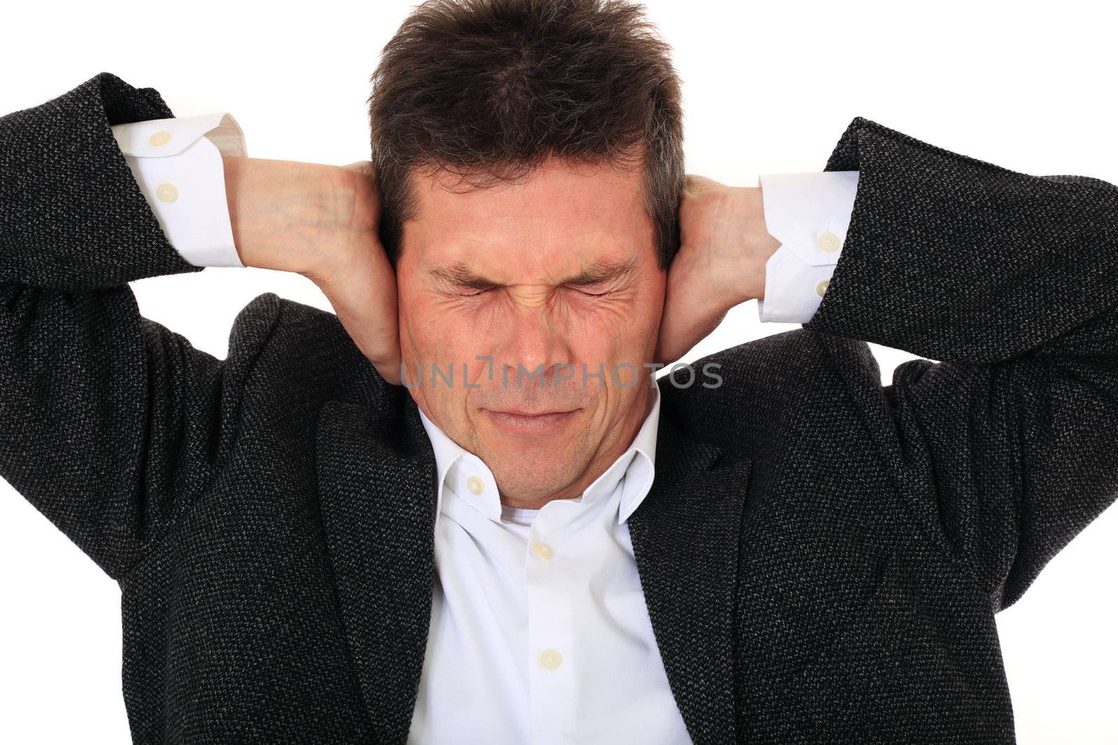 Attractive middle-aged man suffering from headache. All on white background.