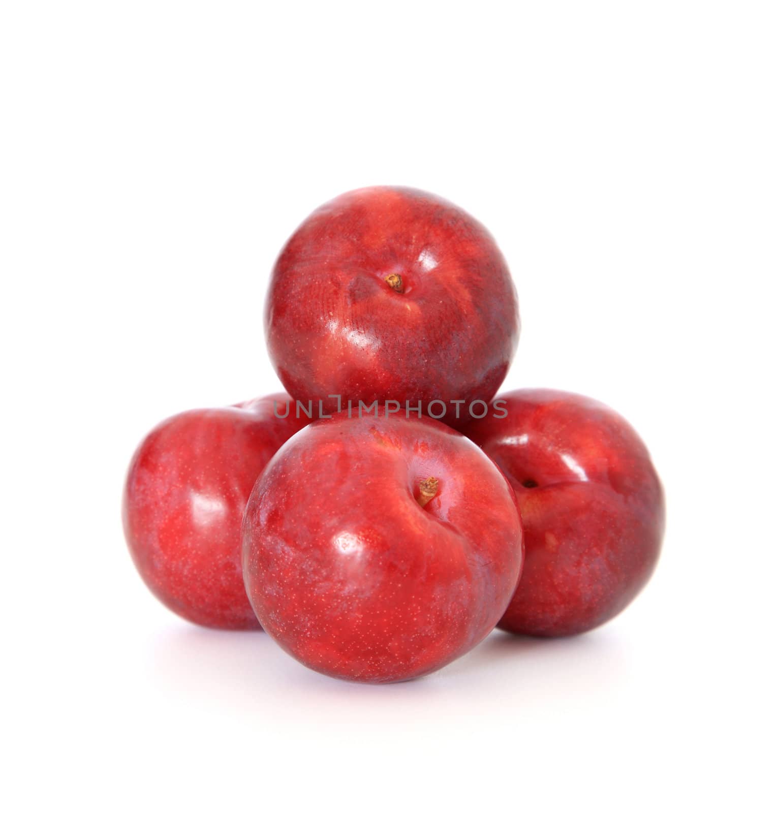 Red apples on white background.