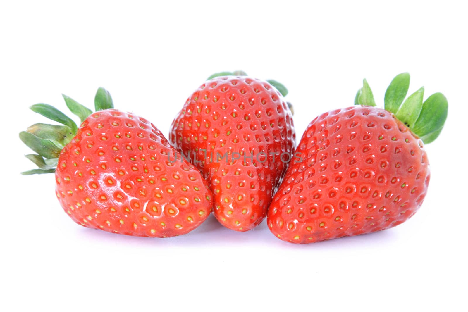 Strawberries on white background.